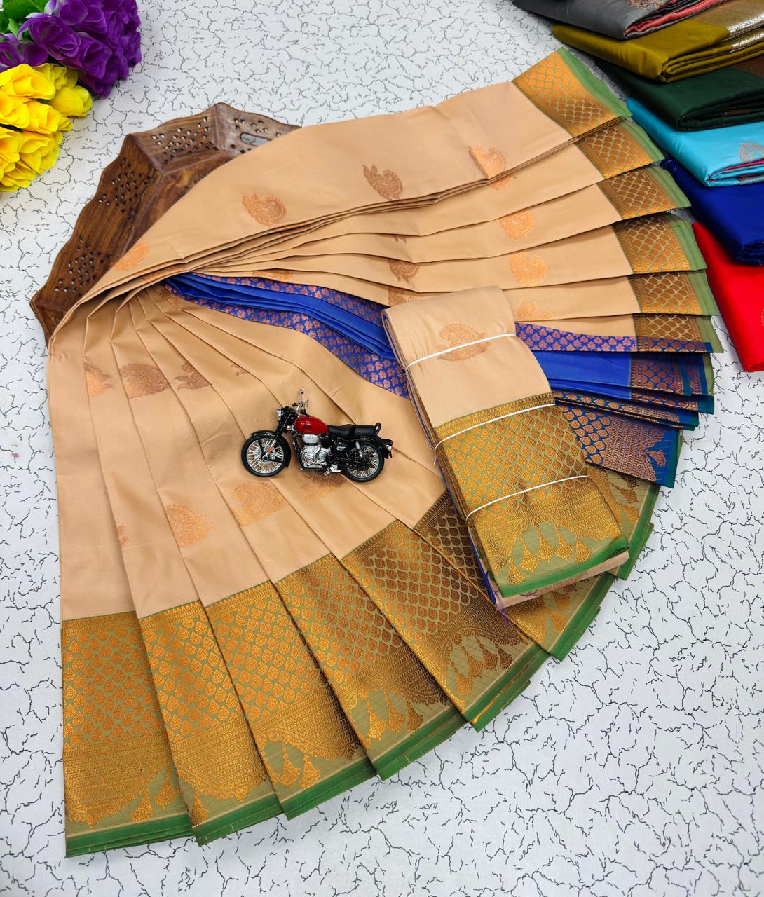 Beige Paisley Butta Kanchi Border Soft Silk Saree