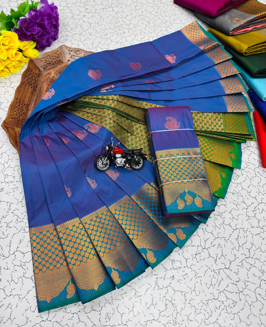 Blue Paisley Butta Kanchi Border Soft Silk Saree