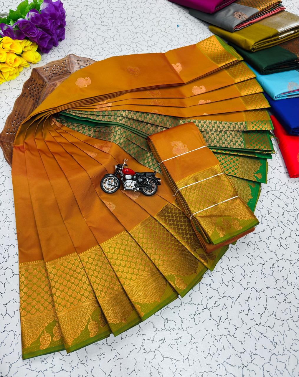 Mustard Paisley Butta Kanchi Border Soft Silk Saree