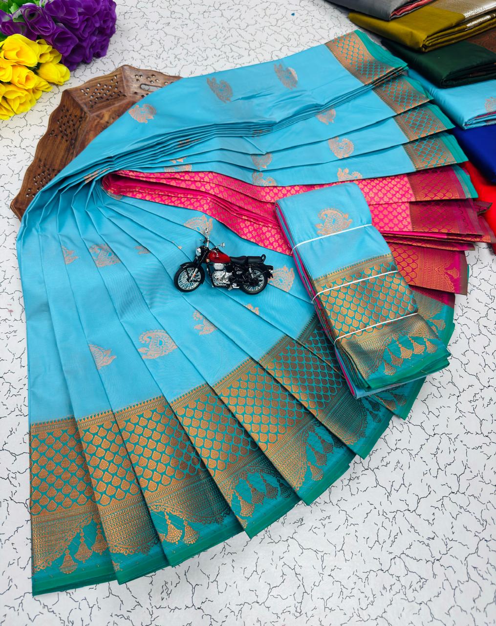 Sky Blue Paisley Butta Kanchi Border Soft Silk Saree