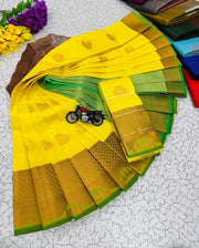Yellow Paisley Butta Kanchi Border Soft Silk Saree